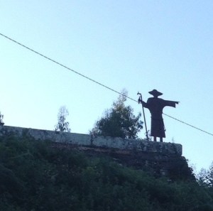 Pilgrim pointing the way