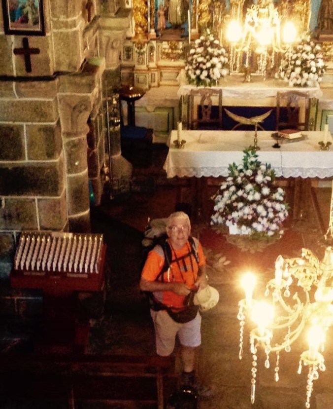 A fellow peregrino visitsing one of the parish churches.
