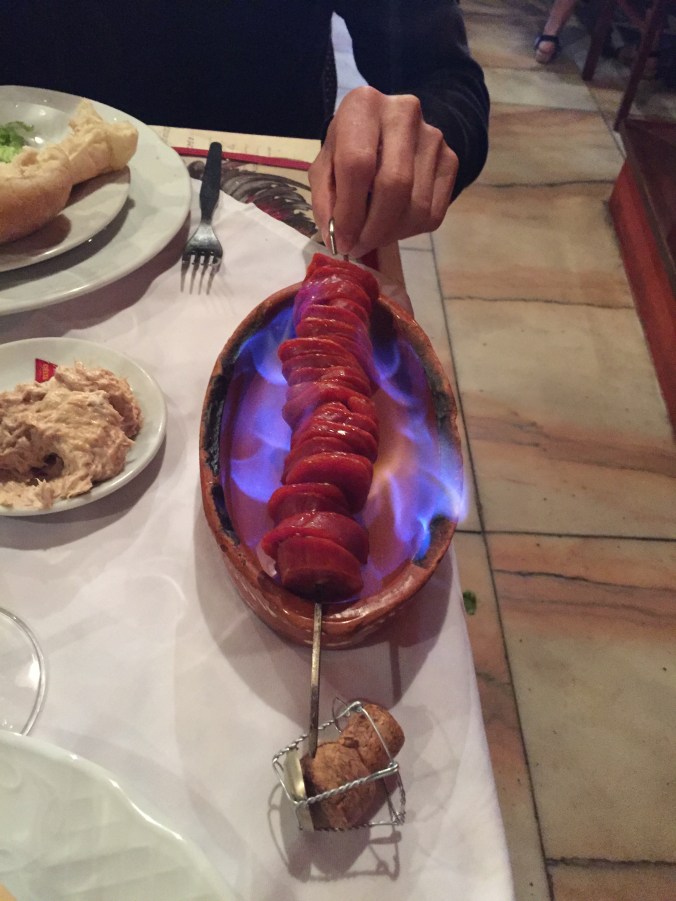 You know it's a good night when you there's unlimited vinho and flaming sausage at the table.