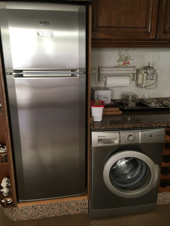 Washing machines are often built into kitchens in Spain and other parts of Europe.