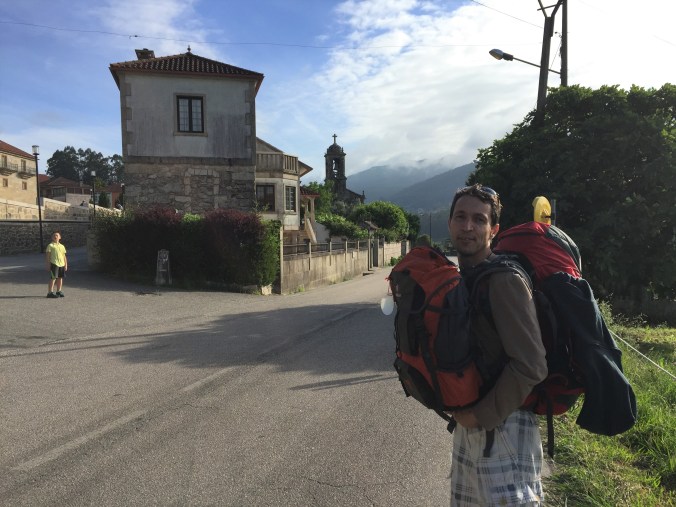 Dobry carrying two backpacks